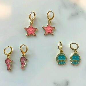 Set of three beach themed earrings seahorses,‎ starfish and jellyfish
